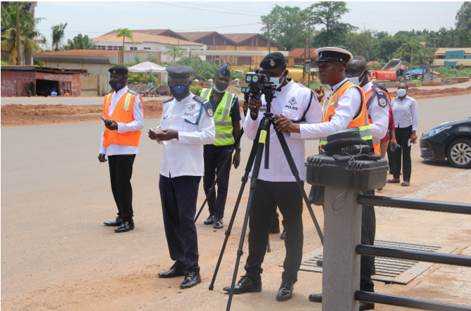   An officer showing how the speed barometer is used.